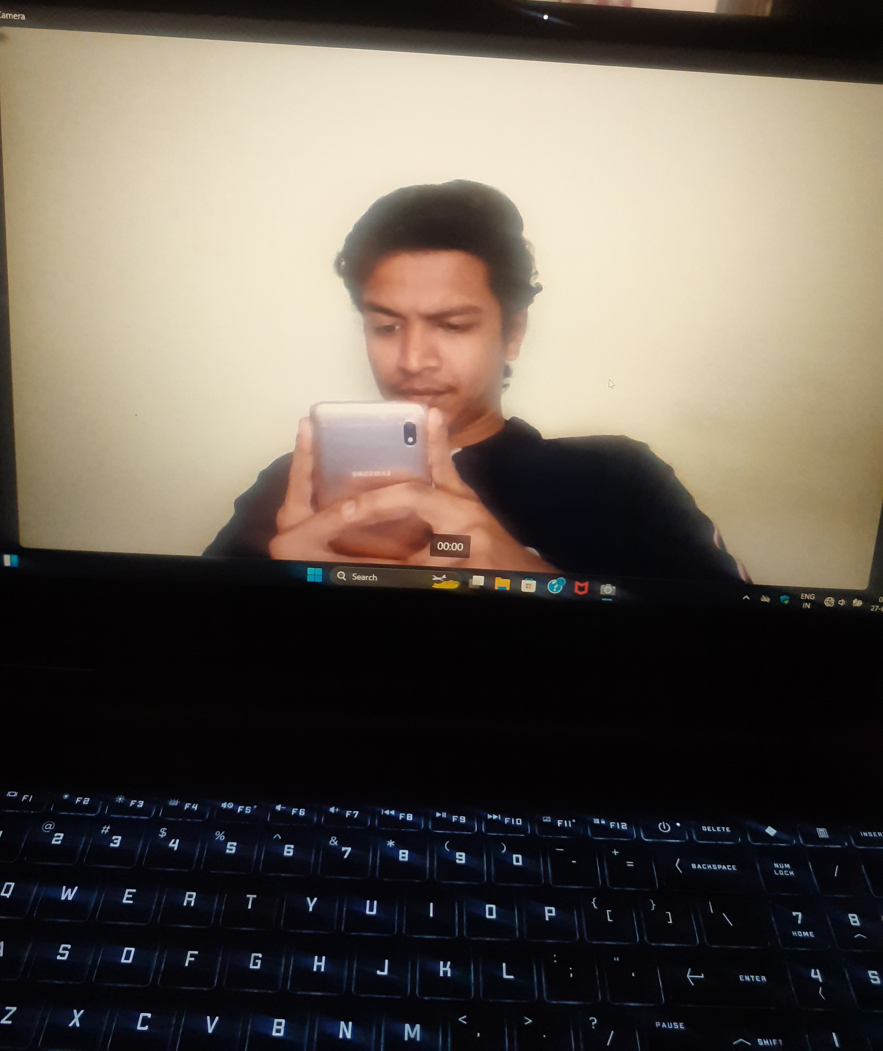 Prathamesh Kasar reflected in a laptop screen